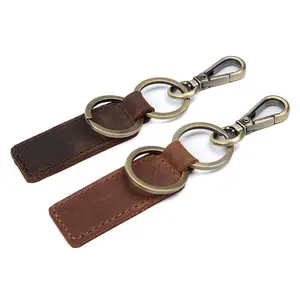 Cá nhân hoá tùy chỉnh khắc logo sang trọng da bò điên ngựa trống da chính hãng chủ Keychain với chiếc Nhẫn vàng