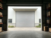 Les portes rapides coupe-feu en acier modernes et idéales conviennent aux centres de données, aux garages, aux projets de défense aérienne civile, etc.