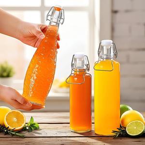 Bouteilles <span class=keywords><strong>en</strong></span> <span class=keywords><strong>verre</strong></span> rondes à bouchon basculant de 250 ml, 500 ml, 750 ml, 1000 ml pour <span class=keywords><strong>eau</strong></span> minérale et <span class=keywords><strong>eau</strong></span> gazeuse, traitement de <span class=keywords><strong>surface</strong></span> par estampage à chaud, vente <span class=keywords><strong>en</strong></span> gros - Product Image 3