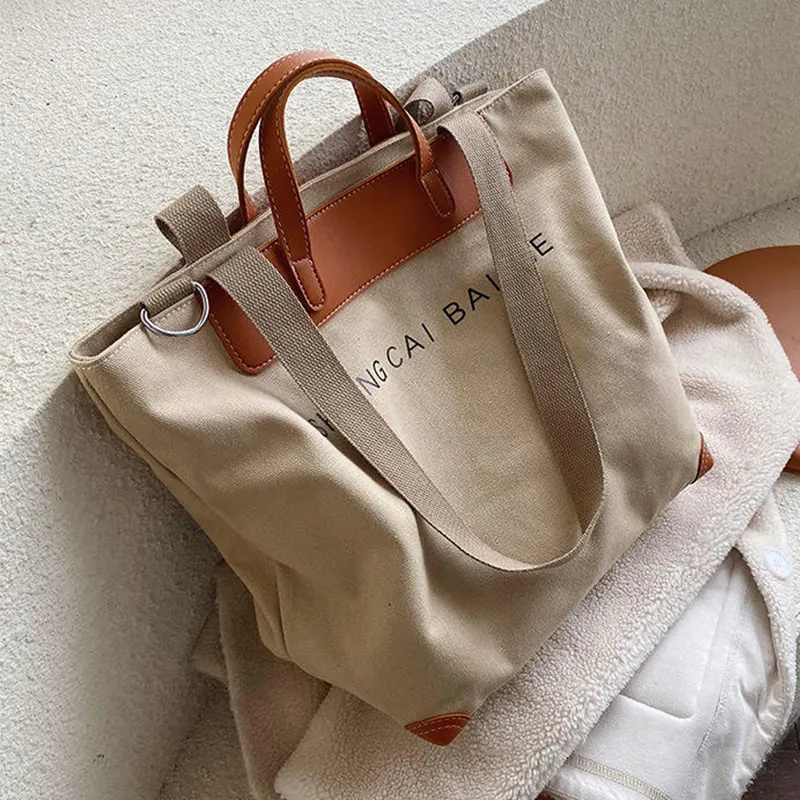Nouveau design de sac fourre-tout en toile de coton à grande poignée en cuir imprimé personnalisé avec fermeture éclair et logo personnalisé