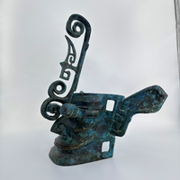 Sanxingdui Bronze tête humaine couronne artefact mis au jour caractéristiques culturelles artistiques uniques ruines artisanat en métal distingué