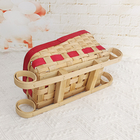 Panier tressé de Noël en forme de traîneau du Père Noël pour collations, fruits et décoration, également panier à pain et organisateur de service