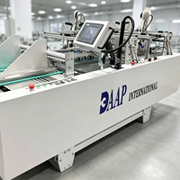 Machine d'application automatique de ruban adhésif double face pour l'industrie de l'emballage