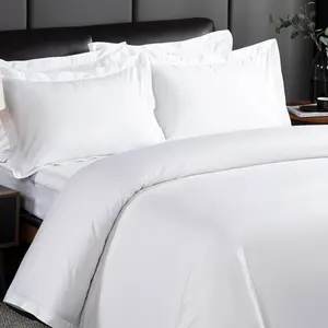 ชุดเครื่องนอนผ้าฝ้ายสีขาวสำหรับโรงแรมชุดเครื่องนอนผ้าฝ้ายชุดผ้าปูที่นอนหรูหราชุดเสื้อผ้า100โรงแรม