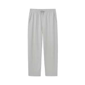 Pantalones de punto ligeros para hombre con corte ajustado y bolsillos laterales para un estilo casual elegante en casa o para ir de compras. - Product Image 1