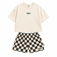 Conjunto de Camiseta y Pantalones Cortos de Algodón para Niños, Diseño Personalizado 2026, Estilo Oversize con Hombros Caídos, Estampado a Cuadros, Ropa Urbana para Niños Pequeños, Muestra OEM