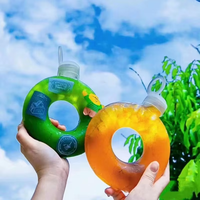 Vente en gros de bouteille en forme de beignet en plastique PP de 500ml avec bouchon à vis écologique pour boisson lait thé jus boissons gazeuses