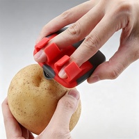 Éplucheur manuel créatif pour légumes, fruits, pommes de terre et pommes, en acier inoxydable, plastique et silicone, avec lame tranchante et poignée ergonomique double pour les doigts