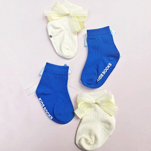 Nuovi calzini lunghi da ragazza Casual <span class=keywords><strong>a</strong></span> maglia primavera e autunno calzini antiscivolo <span class=keywords><strong>a</strong></span> <span class=keywords><strong>righe</strong></span> solide con fiocco <span class=keywords><strong>a</strong></span> metà polpaccio - Product Image 3