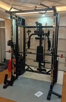 Entraîneur multifonctionnel à bas prix Cage de musculation Crossover de câbles Power Gym Squat Rack Machine pour l'entraînement à domicile