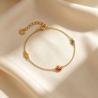 Pulsera Glowluxe con Cadena para el Ojo, Motivo de Mariquita y Mano, Plata de Ley 925, Tono Dorado, Joyería Moderna y Simbólica