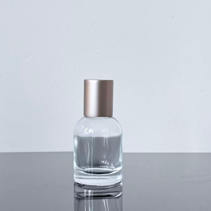 Botella de Perfume de Vidrio Transparente Redonda Personalizada, Vacía, de 30 ml, 50 ml, 100 ml, con Pulverizador y Tapa - Product Image 6