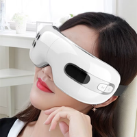 Appareil de massage oculaire rafraîchissant avec chaleur, vibrations et musique pour le traitement de la fatigue oculaire – Masseur oculaire à compression d'air chaud et froid