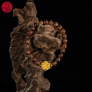 Bracelet en bois d'agar naturel, brin unique, 6 mm, bois vieilli fissuré à fort pouvoir flottant, bijou parfumé très huileux et rare - Product Image 1