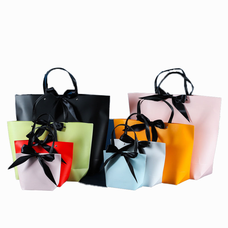 Luxury Gift Paper Bag Custom logo Print Kraft Shopping Paper Bag With Ribbon Handles