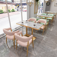 Ensemble de meubles de restaurant occidental minimaliste de haute qualité chaises de table à manger en cuir doré à cadre en métal moderne pour café