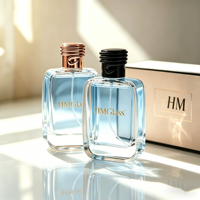 Flacon de parfum HANMING de haute qualité HH-060 50ml 100ml avec bouchon en plastique spiralé personnalisé, boîte cadeau de forme spéciale imprimée à l'écran