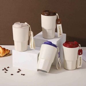 แก้วกาแฟสแตนเลสสตีลทันสมัยพร้อมฝาปิด แก้วน้ำเก็บความร้อนสุญญากาศ ดีไซน์มินิมอล เก็บอุณหภูมิได้นาน 12-24 ชั่วโมง เก็บความร้อนและความเย็น - Product Image 1