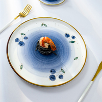 Service de vaisselle en porcelaine 16 pièces de haute qualité avec logo personnalisé vaisselle ronde cyan brillante assiettes en céramique lavable au lave-vaisselle à usage domestique