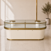 Comptoir de présentation de bijoux en verre incurvé ovale avec portes coulissantes verrouillables, cadre en bronze brossé pour boutique de détail