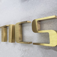 Lettres de logo en acier inoxydable 3D brossé plaqué or personnalisées en usine
