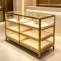 Meubles de magasin de détail sur mesure de luxe, comptoir d'exposition en verre trempé éclairé par LED pour les boutiques de centres commerciaux