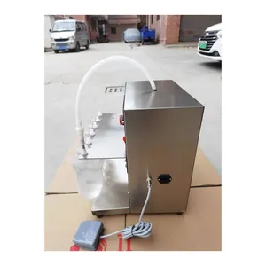 Manufacturers Semi Automatic Suction nozzle bag Washing liquid preformed bag liquid filling and capping machine for sale