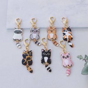 Llavero de moda con colgante de gatito adorable y coloquio de cola, para bolso, memoria USB y auriculares, modelo YK14 - Product Image 1
