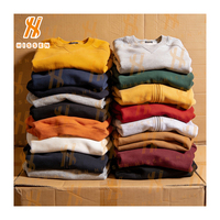 Vêtements de Marque Usagés en Gros : Lots Mixtes de Vestes, Chemises et Vêtements de Sport