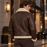 Nouvelle arrivée, veste pour homme, finition cuir, col en fourrure, fermeture éclair métallique, languettes latérales, veste d'aviateur d'hiver, streetwear