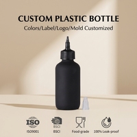 Bouteille souple personnalisée en LDPE noir de 120 ml (4 oz) avec col 24/410, finition mate ou brillante, avec bouchon applicateur pour huile capillaire et coloration