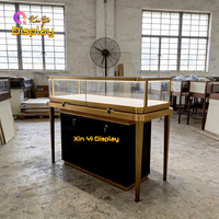 Vitrine à bijoux moderne de luxe en verre trempé avec portes coulissantes, écologique et de haute qualité, personnalisable pour les magasins de détail