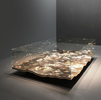 Table basse en verre ultra-blanc de style artistique moderne avec design en acrylique à ondulation d'eau Mathieulehanneur pour meubles de salon et de maison