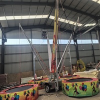 Trampoline rond en caoutchouc extérieur commercial 4-en-1 pour quatre enfants et adultes, construction en acier, parc d'attractions