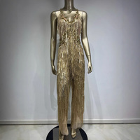 Meilleures ventes : Combinaisons de scène à franges dorées, tenues de boîte de nuit à paillettes brillantes et costumes de performance pour célébrités