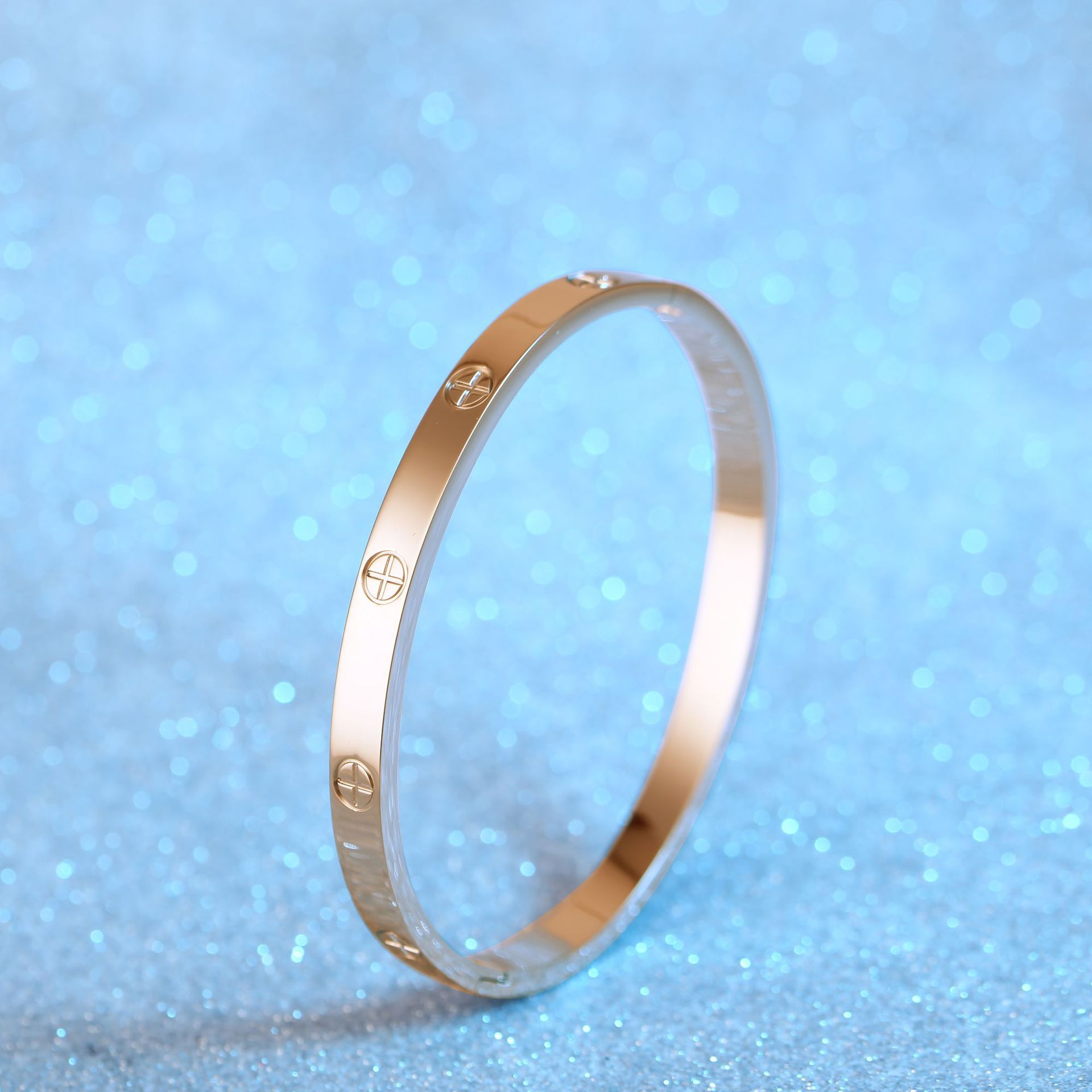 Croix pour femme en or rose