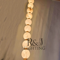 Lustre en albâtre naturel, lumière linéaire longue, tailles personnalisables, styles multiples, adapté aux escaliers, aux halls et aux salons