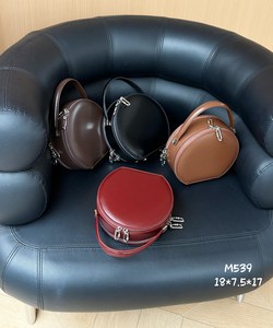 Sac à main rond au design élégant, sac de luxe en cuir véritable pour femme, sac simple et décontracté à porter à l'épaule ou en bandoulière - Product Image 2
