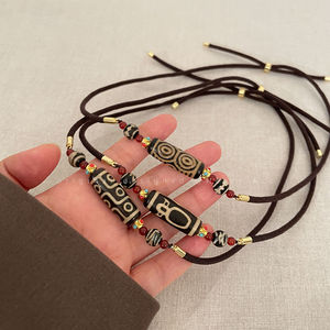 Collier de perles Dzi à neuf yeux de style tibétain Feng Shi, en agate, artisanat manuel, unisexe, artistique, rétro, chaîne de pull tendance - Product Image 1