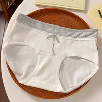 Ropa interior nueva 10A cómodo verano estilo fino mujeres jóvenes antibacteriano Floral Pastoral Bikini bragas con logotipo de cintura