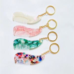 Peine de bolsillo portátil de viaje de moda creativa con llavero Mini llavero de Peine de acetato - Product Image 2