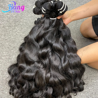 Cheveux humains de couleur naturelle tisse des extensions de paquet de cheveux bruts pour les femmes vendeur en gros