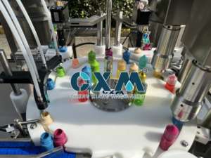 Línea de Llenado y Tapado Automática Personalizada para Botellas de Bebidas y Productos Químicos, para Agua Pura (10ml 100ml) con Motor PLC - Product Image 5