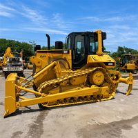 Bulldozer à chenilles robuste CAT D6M pour la remise en état des terres agricoles et l'installation de systèmes de drainage