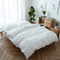 Ensemble de literie en tissu synthétique brossé blanc personnalisable, ensemble de housse de couette quatre pièces pour hôtel, maison d'hôtes