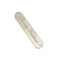 Étiquette ovale en métal argenté de haute qualité logo de marque personnalisé plaque d'étiquette en métal pour vêtement