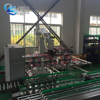 Machine d'emballage robotisée pour sachets, bouteilles, canettes, sacs et barils de boissons - Emballeuse robotisée haute précision
