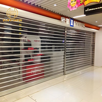 Porte roulante électrique pour centre commercial, porte commerciale en polycarbonate PC, porte à enroulement transparente à vue complète, volets roulants transparents à vendre