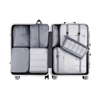 Organisateur de vêtements en filet 8 pièces Ensemble de bagages de voyage Cubes d'emballage de compression avec logo personnalisé Boîtes de rangement et bacs