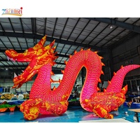 Zhenmei annonçant le dragon chinois gonflable géant pour l'événement